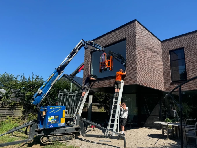 Glaszetter in de bouw Houthulst, West-Vlaanderen